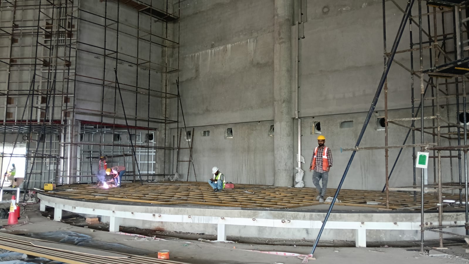 IronEdge team welding the stage support grid on site
